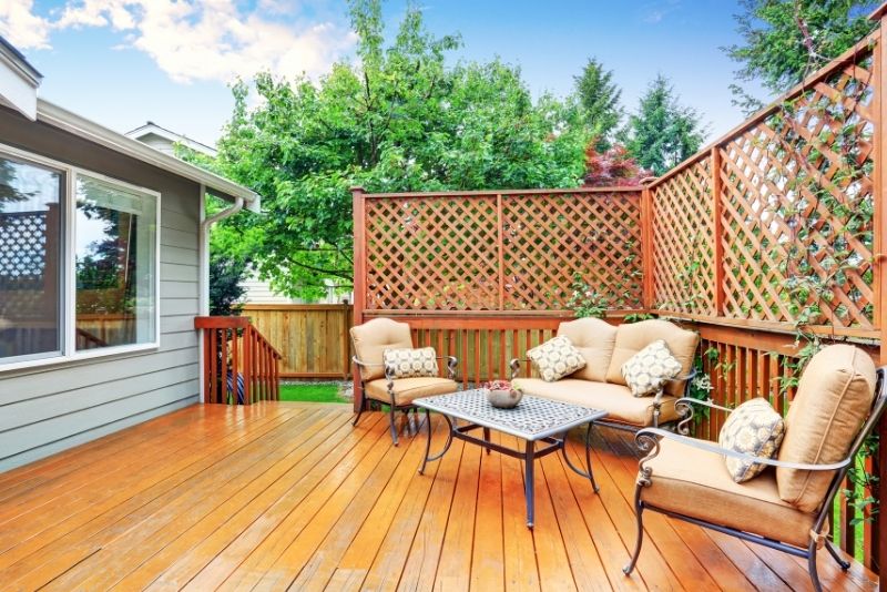 uncovered house extension with wooden decks above the ground