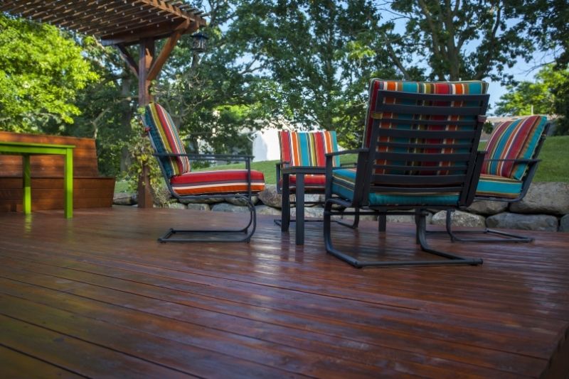 shiny decking design with chairs on top