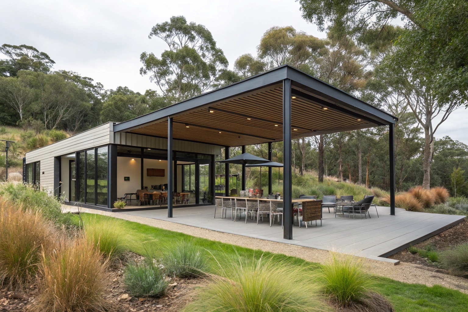Modern steel frame outdoor pavilion construction matching contemporary Canberra home design